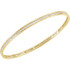 Elegant 14Kt yellow gold diamond stackable bangle 7.5" bracelet featuring a sparkling display of white round diamonds. Total weight of the diamonds is 2 1/4cts. Total weight of the gold is 8.99 grams.