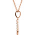 Beautiful 14Kt rose gold heart necklace features a single white shimmering diamond with 1/8 carats hanging from a 16" inch cable chain which is included.