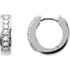 Brilliant diamonds adorn these petite hoop earrings in 14k white gold. A versatile look for evening or everyday wear.