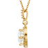An impressive round diamond framed in additional round diamonds is the focal point of this extraordinary necklace for her. The pendant, fashioned in 14K yellow gold, is suspended from an 18-inch chain secured with a spring ring clasp. The total diamond weight is 7/8 carats.