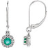 You'll feel like royalty in these breathtaking genuine emerald drop earrings, enhanced by .08 ct. t.w. diamonds in a platinum setting.