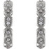 Superb style is found in these Platinum Granulated J-Hoop earrings accented with the brilliance of round full cut diamonds. Total weight of the diamonds is 1/6 carats.