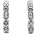 Superb style is found in these Sterling Silver Granulated J-Hoop earrings accented with the brilliance of round full cut diamonds. Total weight of the diamonds is 1/8 carats.