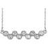 Beautiful 14Kt White gold graduated bezel set 1/2 ct. tw. diamond necklace hanging from a 16-18" inch chain which is included.