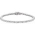 Flash some brilliance with this breathtaking tennis bracelet, showcasing dazzling round diamonds in complementing 14k white gold. 