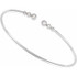This graduated bangle bracelet showcases round diamonds set in 14k white gold.