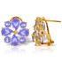 You will be blown away by the stunning periwinkle color of these 14K gold French Clip Earrings with Natural Tanzanites. These gentle gemstone beauties offer amazing vibrance and unparalleled shine. Each earring features four 3.25 carat Tanzanite stones that are pear shaped. These stones are set in a flower design and each petal is separated by another 1.60 carat round Tanzanite jewel. They are detailed, dressy, and will make you feel fresh and beautiful. Since they are made of 14K gold, these will last a lifetime. Bring color and class to your outfit with these amazing, mood-lifting french clips.