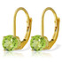 These 14k gold leverback earrings with peridot stones put a twist of style on the look of traditional solitaire gems. The leverback designs make these very stylish, while also holding them securely in place comfortably on the earlobes. Two round cut peridot stones adorn the surfaces of these stunning earrings, with 1.20 carats of dazzle. These earrings are stylish without being too trendy, making them perfect for any woman with any type of style. These make a fun gift to give to a woman celebrating her birthday in August, allowing her to show off the beautiful lime green hue of her dazzling birthstone.