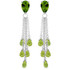 These fabulous earrings will make anyone green with envy when they see the dazzling sparkle that they produce. Two pear shaped natural peridot stones hug the ears with 3.50 carats of shimmer on these 14k gold chandelier earrings with briolette peridot. Those who love this beautiful green stone will adore the additional twelve carats of glamorous briolette shaped stones that dangle elegantly from delicate white gold chains, producing lots of movement for a piece of jewelry that offers a fun look for any ensemble.