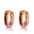 Add color and style to any outfit wit these 14k solid gold hoop huggie earrings with garnets. This classic style looks great when hugging the earlobes and can be worn anywhere. Solid 14k gold ensures that these earrings are of the highest quality. Ten princess cut garnet stones are set in this pair, with a total weight of 1.30 carats. Each garnet has natural inclusions to add to its beauty, while adding sparkle to a traditional style of earrings. These earrings are a perfect purchase for any woman. They also make a perfect birthstone gift for all women blowing out their candles in the month of January.