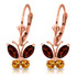These 14k gold butterfly earrings with garnets and citrine are a fabulous way to bring nature into your wardrobe. These cute earrings use beautiful natural gemstones to form the shape of a gorgeous sparkling butterfly. Four marquis shaped garnets at .85 carats, along with four round .39 carat citrine stones are elegantly arranged to form the stunning and unique butterfly shape. 14k white gold is used to hold the look together, adding even more sparkle to each pair. Leverback styles allow these butterflies to dangle perfectly from the earlobes while adding comfort and function.