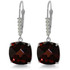 These 14k gold leverback earrings with natural diamonds and garnets take any look from bland to amazing in a way that is both easy and fun to wear. The dramatic look of natural garnets is made more striking with a cushion cut that perfectly shows off the beauty of each stone, which weigh a total of 9.0 carats per pair. Beautiful natural diamonds placed perfectly on each setting enhance the beauty of each dangling stone, with a total of ten genuine diamonds gracing each pair. The leverback settings are made in yellow, white, or rose gold and add just the right touch of glamor to these amazing earrings.