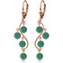 Soft curves and beautiful gems make these 14k gold chandelier earrings with natural emeralds absolutely amazing. The popular chandelier style is made modern with wavy golden bars, crafted out of solid 14k yellow, white, or rose gold. Eight round cut emeralds dangle elegantly from each curve, adding four carats of shimmering beauty. Four total carats add amazing color and shine to this piece. The stylish pendant comes with a matching 14k white gold rope chain. Natural stones, including emeralds, have inclusions that make each stone different and unique. These inclusions do not take away any of the sparkle or beauty from these gemstones.