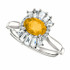 Crafted in platinum, this ring features one oval Genuine Citrine gemstone accented with 18 genuine diamonds. 