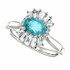 Crafted in platinum, this ring features one oval Genuine Blue Zircon gemstone accented with 18 genuine diamonds. 