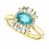 Crafted in 14k yellow gold, this ring features one oval Genuine Blue Zircon gemstone accented with 18 genuine diamonds. 