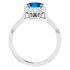 Crafted in 14k white gold, this ring features one oval Genuine Blue Sapphire gemstone accented with 18 genuine diamonds. 