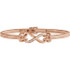 Diamond Infinity-Inspired Rope Bangle Bracelet In 14K Rose Gold. Diamonds are H+ in color and I1 or better in clarity.