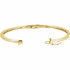 Delicately set in 14k yellow gold, this bangle has five stationed diamonds for a little touch of elegance. 