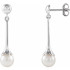 A classic accessory representing her June birthday, these sophisticated pearl drop earrings make any occasion special.