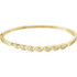 This beautiful bangle 7.5" bracelet showcases seven diamonds stationed in 14k yellow gold. 
