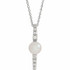 Make a bold and modern fashion statement with this cultured freshwater pearl & Diamond Pendant Necklace in 14k white gold showcased by 8 sparkling accent diamonds set off by a singular freshwater cultured freshwater pearl.

Cultured freshwater pearls measure approximately 6mm to 6.5mm in diameter. Diamonds are rated I1 for clarity, G-H for color, with 1/6 total carat weight.

This distinctive pendant comes suspended on a 14k white gold chain in your choice of lengths (16" or 18"), secured with a ring clasp. 
