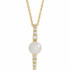 Make a bold and modern fashion statement with this cultured freshwater pearl & Diamond Pendant Necklace in 14k yellow gold showcased by 8 sparkling accent diamonds set off by a singular freshwater cultured freshwater pearl.

Cultured freshwater pearls measure approximately 6mm to 6.5mm in diameter. Diamonds are rated I1 for clarity, G-H for color, with 1/6 total carat weight.

This distinctive pendant comes suspended on a 14k yellow gold chain in your choice of lengths (16" or 18"), secured with a ring clasp. 