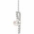 Make a bold and modern fashion statement with this cultured freshwater pearl & Diamond Pendant Necklace in platinum showcased by 8 sparkling accent diamonds set off by a singular freshwater cultured freshwater pearl.

Cultured freshwater pearls measure approximately 6mm to 6.5mm in diameter. Diamonds are rated SI2-SI3 for clarity, G-H for color, with 1/6 total carat weight.

This distinctive pendant comes suspended on a platinum chain in your choice of lengths (16" or 18"), secured with a ring clasp. 