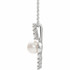 Make a bold and modern fashion statement with this cultured freshwater pearl & Diamond Pendant Necklace in sterling silver showcased by 8 sparkling accent diamonds set off by a singular freshwater cultured freshwater pearl.

Cultured freshwater pearls measure approximately 6mm to 6.5mm in diameter. Diamonds are rated I1 for clarity, G-H for color, with 1/6 total carat weight.

This distinctive pendant comes suspended on a sterling silver chain in your choice of lengths (16" or 18"), secured with a ring clasp.