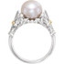 Crafted in sterling silver & 14k yellow gold, this freshwater pearl ring features gorgeous Fleur de Lis side accents.