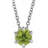 Crafted in sterling silver, this jewelry has a polished finish for eye-catching design. The necklace features a charming peridot gemstone to complete the look.