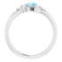 Dainty and feminine, this gemstone ring sets an elegant tone. The ring is set in platinum.