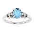 Dainty and feminine, this gemstone ring sets an elegant tone. The ring is set in platinum.