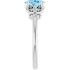 Dainty and feminine, this gemstone ring sets an elegant tone. The ring is set in platinum.