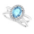 Dainty and feminine, this gemstone ring sets an elegant tone. The ring is set in platinum.
