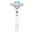 Dainty and feminine, this gemstone ring sets an elegant tone. The ring is set in platinum.