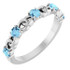 Dainty and feminine, this gemstone ring sets an elegant tone. The ring is set in platinum.