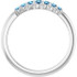 Dainty and feminine, this gemstone ring sets an elegant tone. The ring is set in platinum.