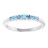 Dainty and feminine, this gemstone ring sets an elegant tone. The ring is set in platinum.