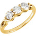 A three-stone ring, also known as a trilogy or trinity ring, symbolizes the past, present, and future of a relationship. The center stone represents the present, while the side stones represent cherished memories from the past and the promise of a future together.