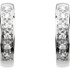 The classic hoop earring has been given a dazzling update. Fashioned in cool 14K white gold, these huggie hoop earrings sparkle with a row of shimmering round diamonds aligned down the front. A great look with any attire, these hoops captivate with 1/10 ct. t.w. of diamonds and a bright polished shine. The hoops secure with hinged backs.