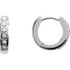 The classic hoop earring has been given a dazzling update. Fashioned in cool 14K white gold, these huggie hoop earrings sparkle with a row of shimmering round diamonds aligned down the front. A great look with any attire, these hoops captivate with 1/10 ct. t.w. of diamonds and a bright polished shine. The hoops secure with hinged backs. 