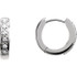 The classic hoop earring has been given a dazzling update. Fashioned in cool 14K white gold, these huggie hoop earrings sparkle with a row of shimmering round diamonds aligned down the front. A great look with any attire, these hoops captivate with 1/10 ct. t.w. of diamonds and a bright polished shine. The hoops secure with hinged backs.