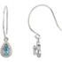 These 9.5x7.25mm oval aquamarine and 1/10 ct. t.w. diamond drop earrings are set in 14K white gold. These earrings suspend from French wires.