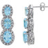 Bold and brilliant, these drop earrings are a sparkling look, perfect for that special evening out. Crafted in cool 14K white gold, each earring features three Sky Blue Topaz set one atop the other, creating a glittering linear look. Radiant with .07 cts. t.w. of diamonds and polished to a brilliant shine, these post earrings secure comfortably with friction backs.