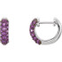 Amethyst reflects the drama and excitement of purple. This colorful hinged hoop design features thirty-eight genuine amethyst stones prong set in 14k white gold. These small huggie style earrings are approximate 2.5mm in width by 10mm (3/8 inch) in length. Total gemstone weight for the pair is 0.62 carat. Color range varies on all natural stones so please allow for slight variations in shades. Gemstone treatment: natural, not enhanced.