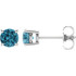 These round blue zircon earrings are set in 14K white gold. The posts of these fine jewelry earrings are secured by friction backs. Gently clean by rinsing in warm water and drying with a soft cloth.
