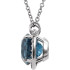 A stunning round-cut London Blue Topaz glimmers at the center of this elegant necklace for her.