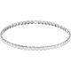 Add a touch of sparkle to your wrist with this elegant and beaded bangle bracelet. Polished to a brilliant shine.