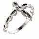 This lovely ring for her features a cross design styled in platinum.